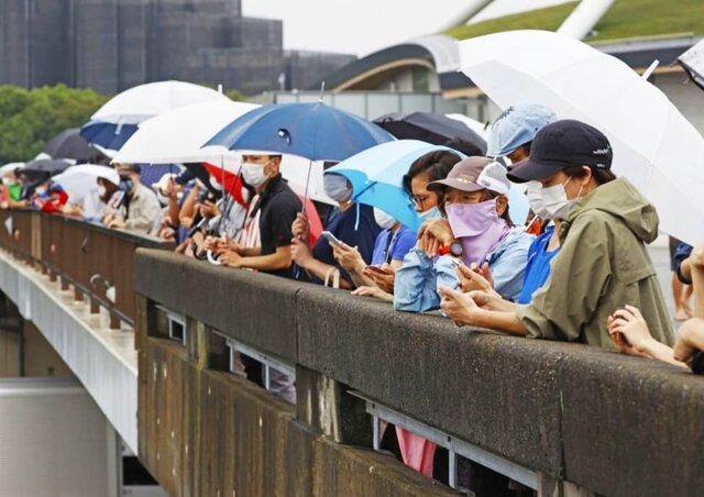 ورود مشعل المپیک به توکیو در میان اعتراض ها و شیوع کرونا